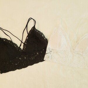 2 bralettes 1 black 1 white size L crossed back straps only worn couple times